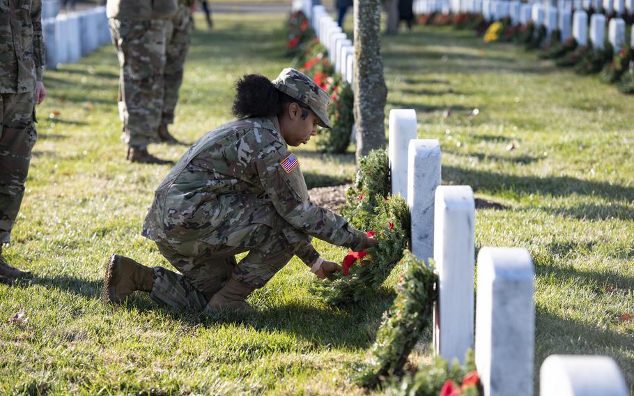 Soldiers assigned to 832nd Ordinance Battalion attend the 32nd Wreaths Across America Day at Arlington National Cemetery, Arlington, Va., Dec. 16, 2023. The soldiers came to ANC to remember U.S. Army Sgt. James Slape from 832nd Ordinance Battalion and others interred in Section 60. 