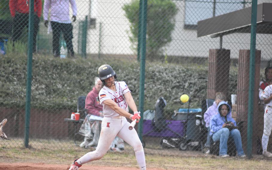 Kaiserslautern's Alessia Garcia makes contact Thursday, May 22, 2025, at the DODEA-Europe Division I softball championships at Ramstein Air Base, Germany.