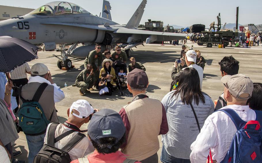 People attend the Friendship Day festival at Marine Corps Air Station Iwakuni, Japan, May 5, 2016.