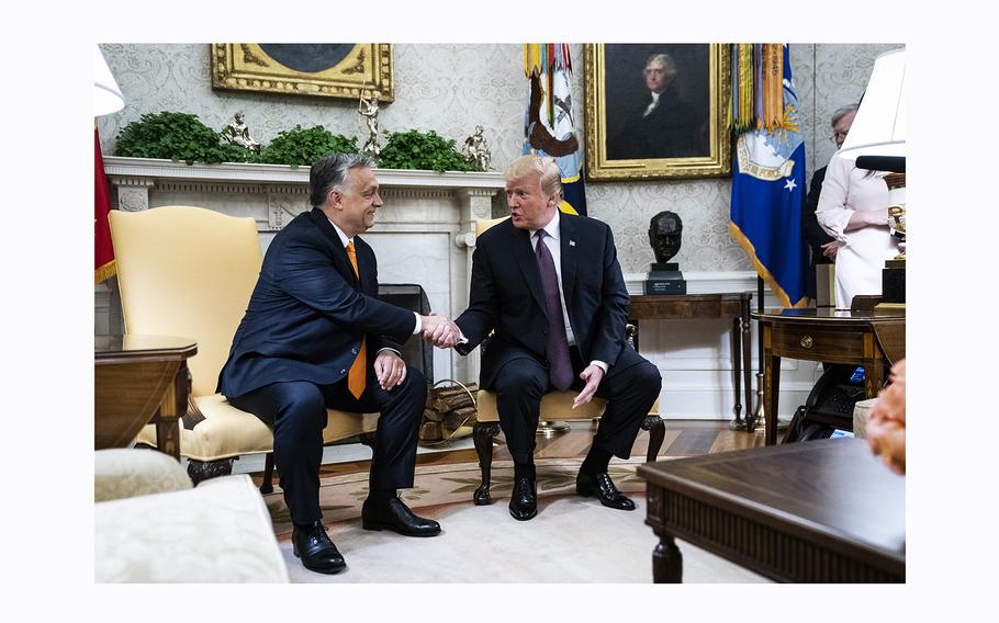 Then-President Donald Trump shakes hands with Hungarian Prime Minister Viktor Orban during a meeting in the Oval Office on May 13, 2019. 