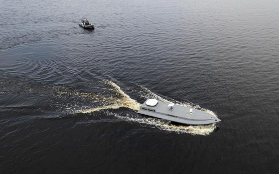 FILE - A sea drone cruises on the water during a presentation by Ukraine's Security Service in Kyiv region, Ukraine, on Tuesday, March 5, 2024. (AP Photo/Evgeniy Maloletka, File)