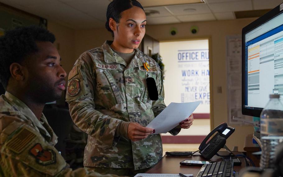 Air Force staff sergeants Destani Alvarado and Michael Wallace examine patient records through Military Healthcare System Genesis at Keesler Air Force Base in Biloxi, Miss., on Jan. 6, 2022. MHS Genesis is the Defense Department’s new consolidated medical recordkeeping system.
