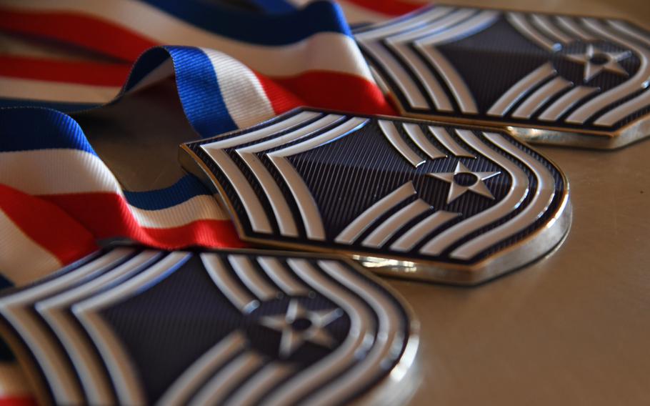 Chief master sergeant rank medallions are displayed April 20, 2023, at Keesler Air Force Base, Miss. This year, the Air Force selected nearly a quarter of the 2,249 eligible candidates for promotion to its most senior enlisted rank.