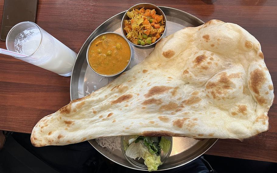 Lunch sets from Andhra Kitchen in Tokyo include curry, all-you-can-eat naan, rice, salad and a lassi all for 880 yen.