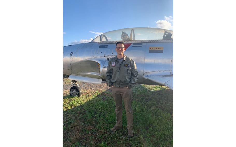 Bill Falls and the 1950s-era T-33 Shooting Star training jet where he discovered a litter of kittens.