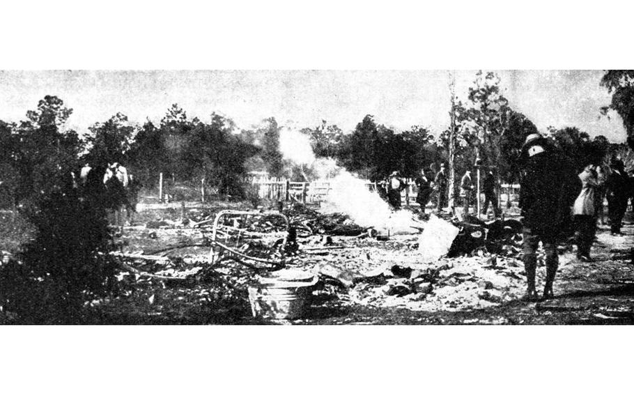 The ruins of a burned house in Rosewood, Fla., in January 1923. 