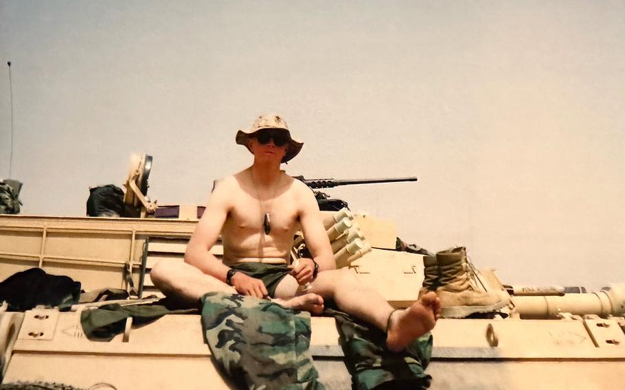 Tim McLaughlin became an officer in the Marine Corps in 2000 and was part of a platoon that was among the first American units to reach Firdos Square. 
