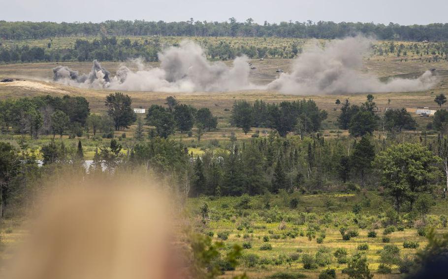 Smoke and dirt billows from the ground during Northern Strike in Camp Grayling on Monday, Aug. 14, 2023. 