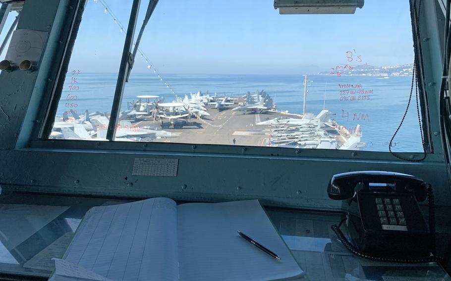 The flight deck is visible from one of the command decks on the USS Harry Truman on May 11, 2022. The carrier arrived in Naples, Italy, the day before for a port visit. 