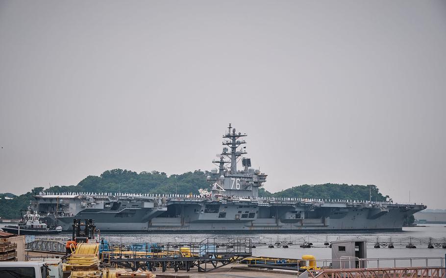 The aircraft carrier USS Ronald Reagan sets out for patrol from Yokosuka Naval Base, Japan, Friday, May 20, 2022.