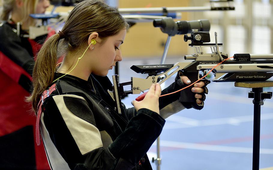 Vilseck's Rheanna Salo works on her rifle during the 2023 DODEA European marksmanship championship on Saturday at Wiesbaden High School in Wiesbaden, Germany.