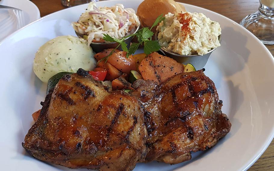 The boneless barbecue chicken, served with two side dishes, from Midtown BBQ in Nagoya, Japan.