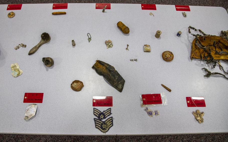 Items found during the Operation Colony Glacier recovery mission are displayed on a table at Joint Base Elmendorf-Richardson, Alaska, June 26, 2020. 