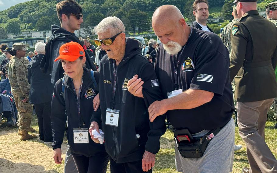 Bill Wall, who was a radio operator and gunner in B-24s and B-17s with the 453rd Bombardment Command, visits Omaha Beach on June 4, 2024. His plane was grounded for maintenance on D-Day but back in the air June 7. He flew more than 30 combat missions and holds the Distinguished Flying Cross and other medals. 