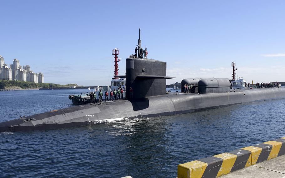 The nuclear-powered submarine USS Michigan pulls into a pier in Busan, South Korea, Friday, June 16, 2023. 