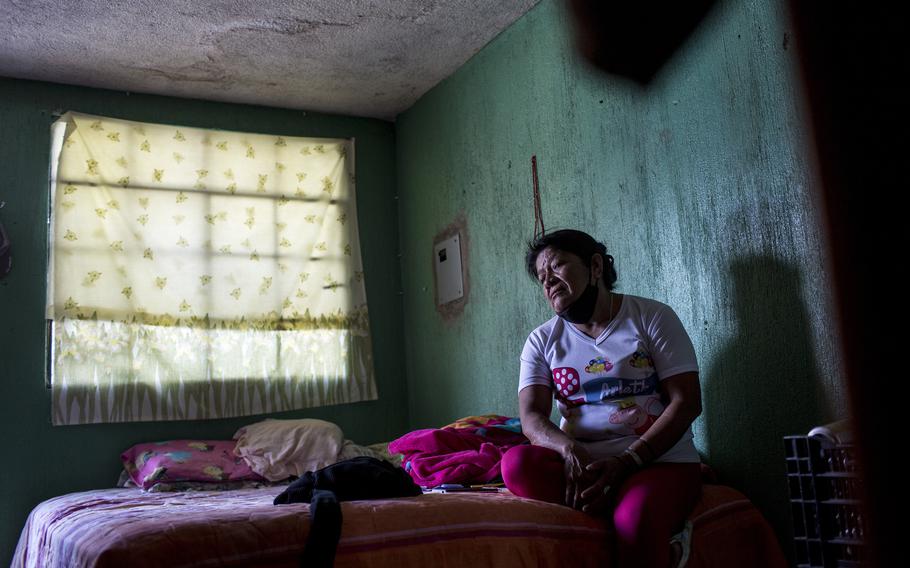 Margarita Alvarado Henriquez, 56 at her house, where she lives with her nephew in Guatemala City, on Feb. 3, 2022. In 1982 she was sexually assaulted by Francisco Cuxum Alvarado during the military occupation of her community. Originally from the village of Ixococ, she was widowed before being abused by Cuxum. She was pregnant at the time the sexual violence occurred, and suffered miscarriage as a result of it. After this event, she never remarried and had no children.