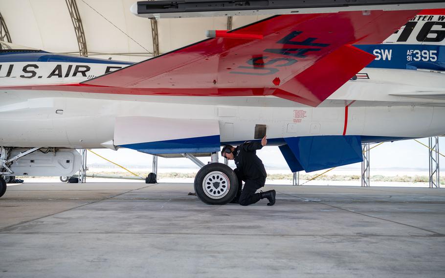U.S. Air Force Senior Airman Elias Sanchez, F-16 Viper Demonstration Team dedicated crew chief, performs a show launch at Edwards Air Force Base, Calif., May 13, 2024. 