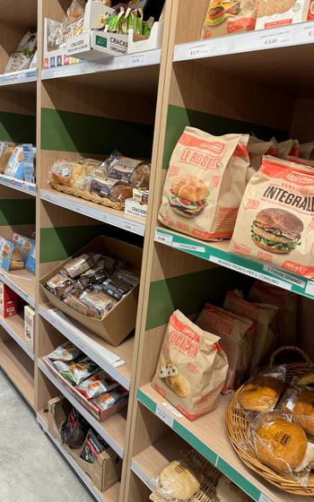 GF breads like hamburger buns on shelves