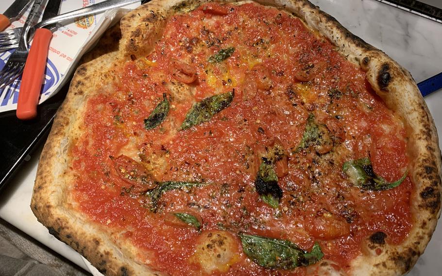 The Ciro, which includes a sauce made with tomatoes grown on the slopes of Mount Vesuvius, is one of the many pizzas offered at Sorbillo in Naples, Italy.