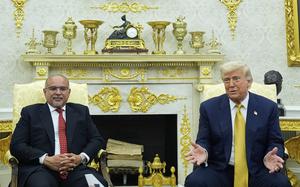 Khalifa and Trump sit next to each other in front of the ornate decor of the Oval Office.