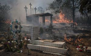Wildfires burn parts of a cemetery in Nogales, Mexico, on March 25, 2024.
