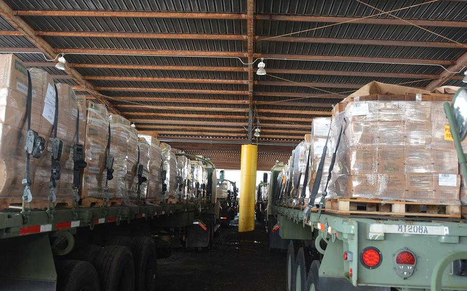 The Louisiana National Guard prepares to distribute supplies to victims of Hurricane Ida in south Louisiana. More than 5,000 members of the Louisiana Guard were assisting with relief efforts.