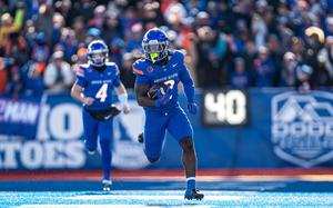 Boise State junior Ashton Jeanty runs with the ball during a Nov. 29, 2024, game against Oregon State at Albertsons Stadium in Boise, Idaho. Jeanty, who began his football career at Naples High School in Italy, was selected No. 6 by the Las Vegas Raiders in the 2026 NFL Draft on April 24, 2025, at Lambeau Field in Green Bay, Wis.
