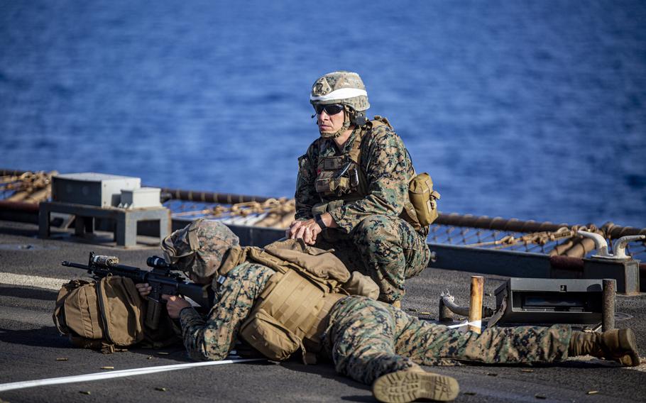 Marines with the 24th Marine Expeditionary Unit participate in live-fire training on the dock landing ship USS Carter Hall in the Mediterranean Sea, May 26, 2021. U.S. 6th Fleet stood up Task Force 61/2, a naval amphibious unit comprised of Marines and sailors to coordinate efforts in Europe ranging from port visits to counter-reconnaissance operations, the task force said in a statement April 1, 2022. 