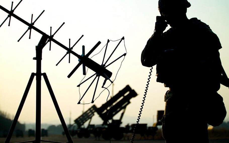 A U.S. soldier assigned to the 35th Air Defense Artillery Brigade talks to his headquarters during the Freedom Shield exercise in South Korea, March 19, 2023.