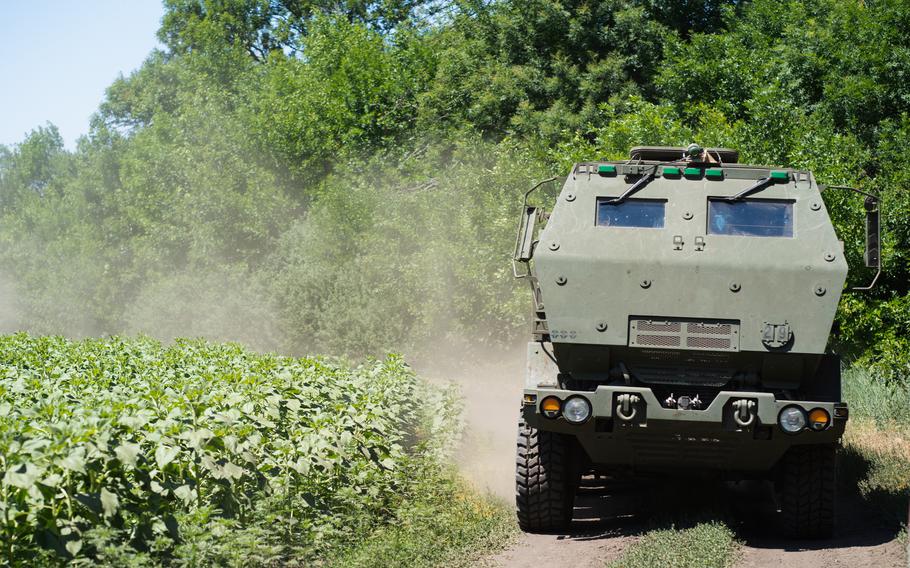 A HIMARS vehicle drives on the road in Eastern Ukraine on July 1, 2022. 