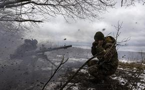 Ukrainian soldiers from the 68th Brigade fire mortars toward Russian positions in a village near the Ukrainian coal-mining city of Vuhledar on Saturday. MUST CREDIT: Photo for The Washington Post by Heidi Levine