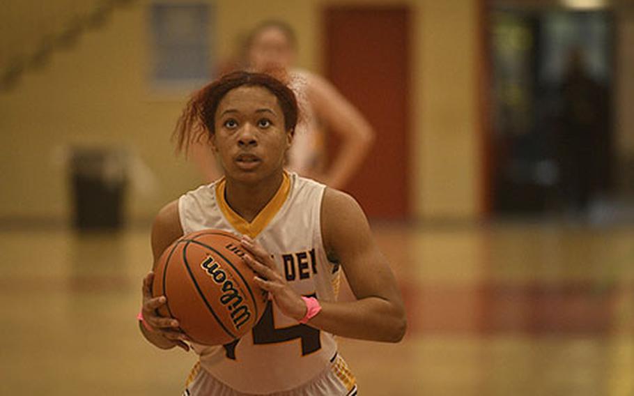 Baumholder’s Janiyah Spruill concentrates as she prepares to shoot a free throw during a DODEA-Europe Division III basketball semifinal game Feb. 17, 2023, in Baumholder, Germany.