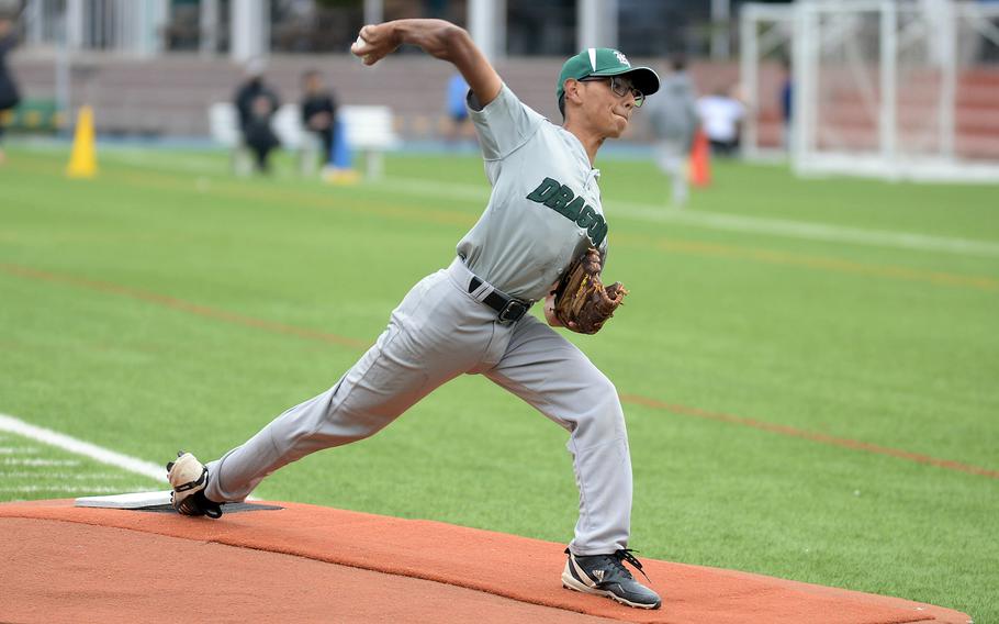 Kubasaki right-hander Julian Hall delivers against American School In Japan during Friday's inter-district baseball game. The Dragons edged the Mustangs 2-1.