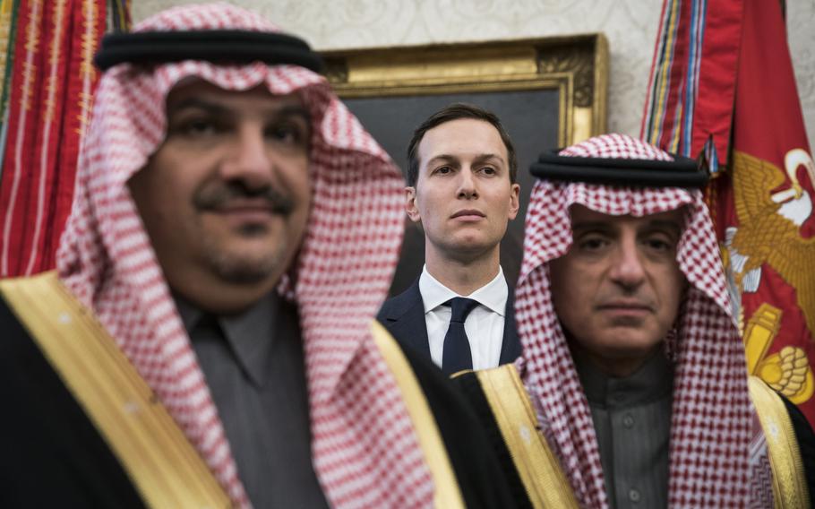 Jared Kushner stands among Saudi officials as Trump talks with Mohammad in March 2018. 