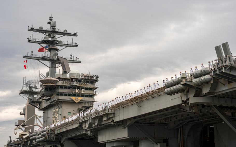 The aircraft carrier USS Dwight D. Eisenhower deploys from Naval Station Norfolk, Va.,on Oct. 14, 2023. The Eisenhower Carrier Strike Group will join the USS Gerald R. Ford in the eastern Mediterranean Sea.