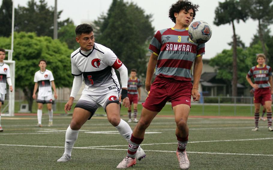 Perry's Kameron Ramos steadies the ball against King's Damian Perez.