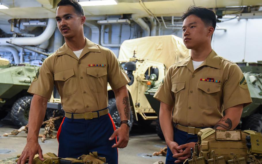 Infantry Marines Cpl. James Rein, left, and Lance Cpl. Jakie Wu, both with 2nd Battalion, 2nd Marines, arrived at Fleet Week in Miami on Sunday, May 5, 2024, aboard the USS Bataan amphibious assault ship.