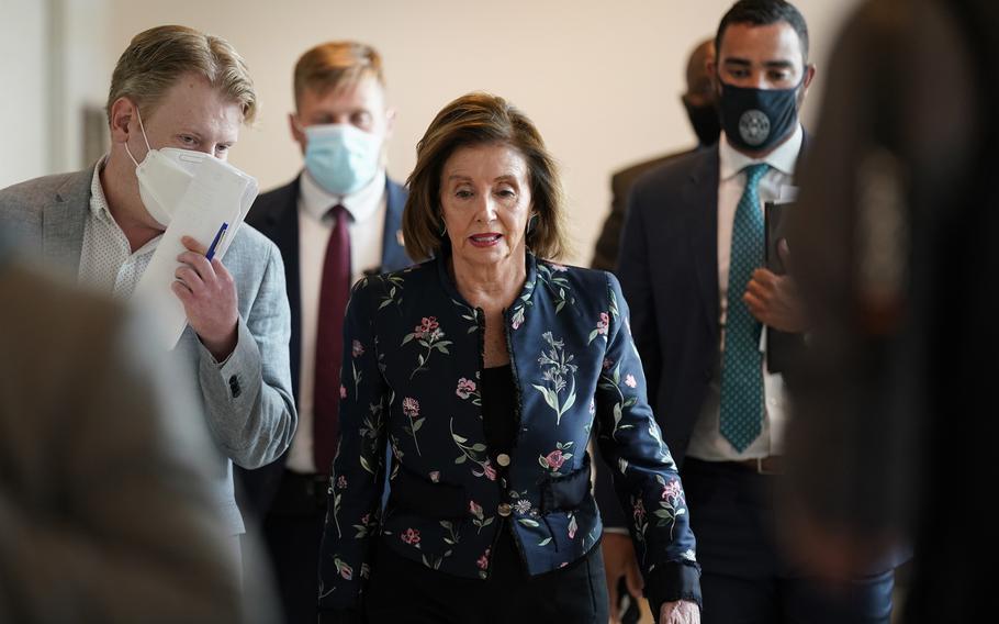 Speaker of the House Nancy Pelosi, D-Calif., arrives to meet with reporters at the Capitol in Washington Thursday.
