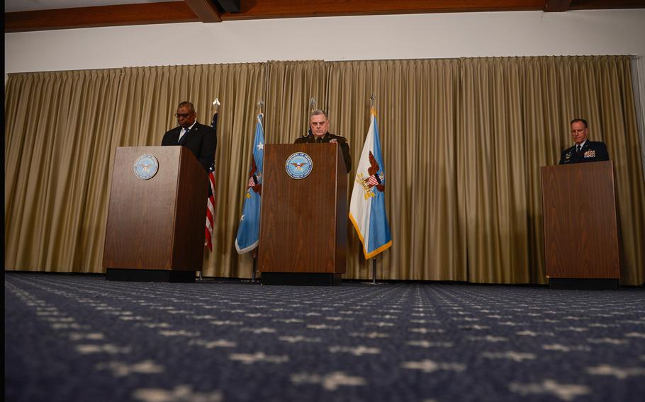 U.S. Defense Secretary Lloyd Austin, left, and U.S. Army Gen. Mark Milley, the chairman of the Joint Chiefs of Staff, speak to reporters at the conclusion of the Ukrainian Defense Contact Group meeting at Ramstein Air Base, Germany, Sept. 8, 2022.