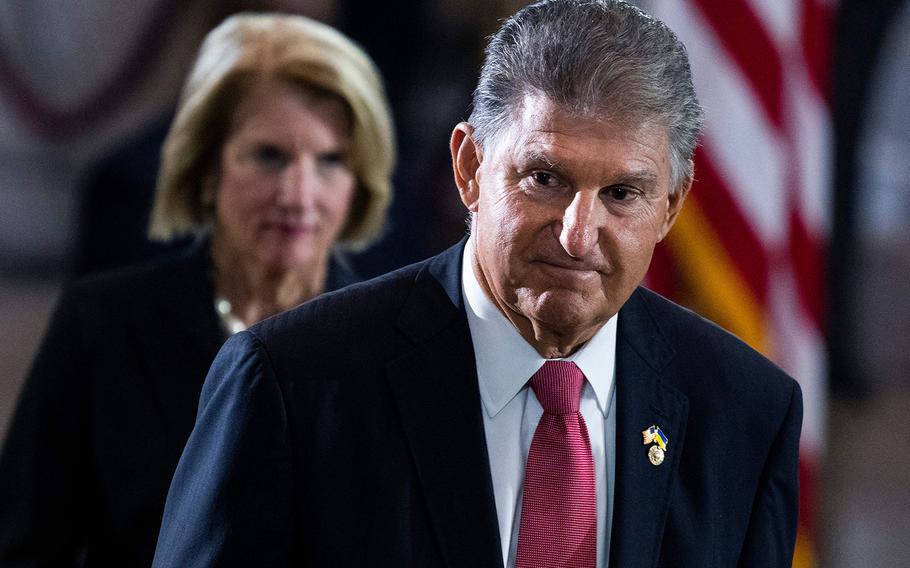 US Sen. Joe Manchin, D-W.V., right, and Sen. Shelley Moore Capito, R-W.V., pay respects to U.S. Marine Corp Chief Warrant Officer 4, Hershel Woodrow “Woody Williams,” lies in honor at the Rotunda of the Capitol in Washington, D.C., on July 14, 2022. Williams, of West Virginia, who died at age 98 on June 29, 2022, was the last living World War II Congressional Medal of Honor recipient. 
