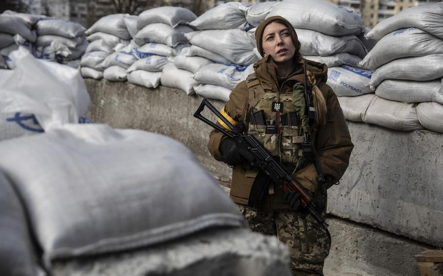 Daria Vasylchenko, a soldier and medic in Ukraine's Territorial Defense Forces, at a sandbagged position in Kyiv, Ukraine, on March 5, 2022. MUST CREDIT: Photo for The Washington Post by Heidi Levine