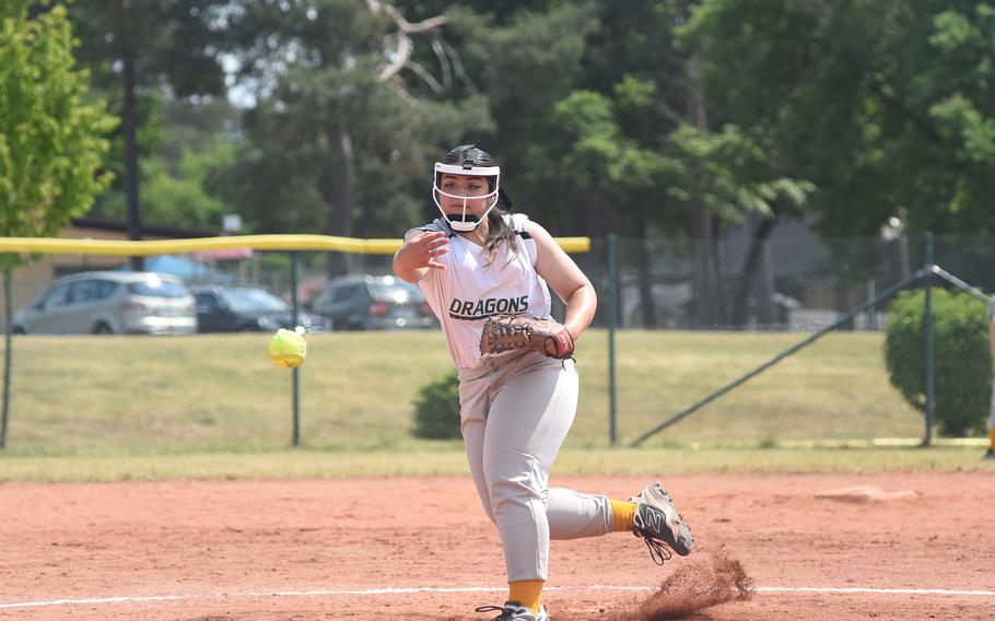 Alconbury pitcher Kalila Te'o kicks up dust while hurling a pitch to the plate Wednesday, May 21, 2025, on the opening day of the DODEA-Europe Division II/III softball championshps at Ramstein Air Base, Germany.