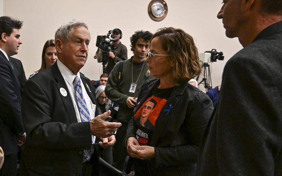 Rep. Joe Wilson (R-S.C.) speaks to family members of hostages held in Gaza, including the parents of Itay Chen, at the Rayburn House Office Building in Washington in November. 
