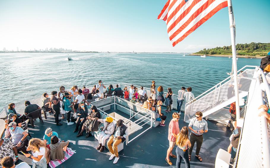 A ferry to Boston Harbor Islands National and State Park; Spectacle Island is on right. 