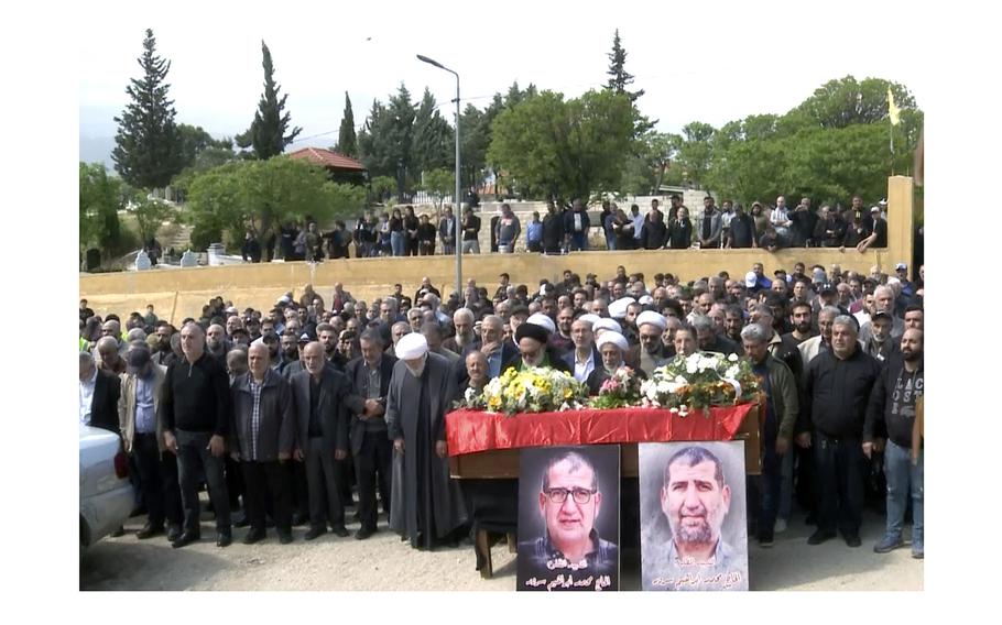 A video screen grab shows mourners praying, on April 11, 2024, during a funeral procession in Labweh village, for Lebanese money changer Mohammad Srour who was found tortured and killed inside a villa in Monte Verdi neighborhood of Beit Meri. Lebanon’s interior minister alleged Wednesday, April 18, that the mysterious abduction and killing of Srour was likely the work of Israeli operatives.