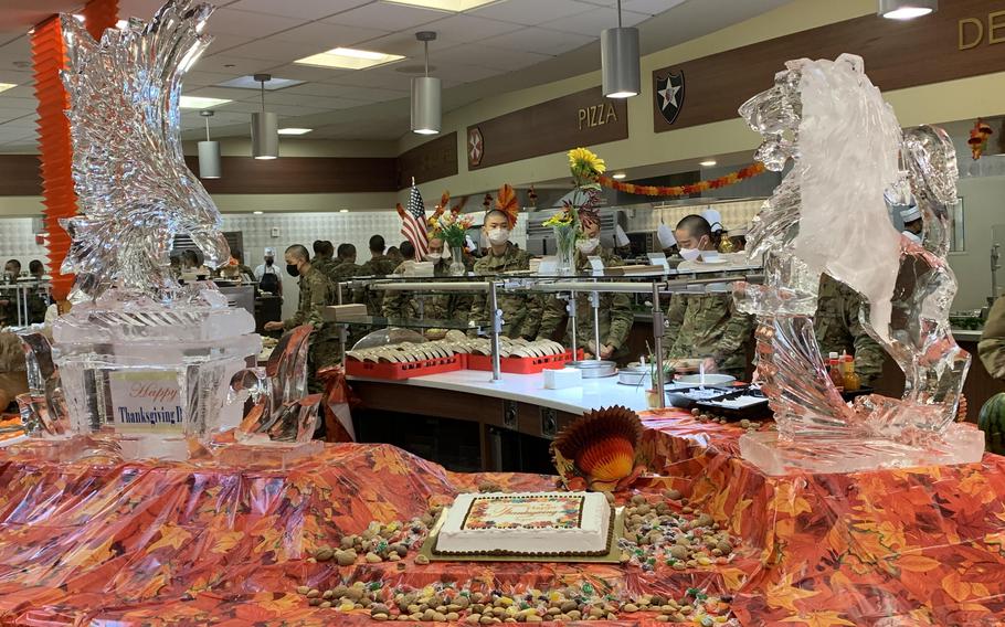 Thanksgiving Day diners were met by ice sculptures and a cake at the Spartan Warrior Restaurant at Camp Humphreys, South Korea, on Nov. 25, 2021.