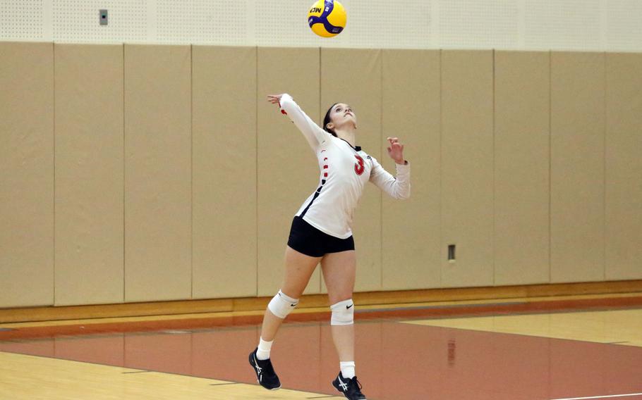 Madison Welsh serves.