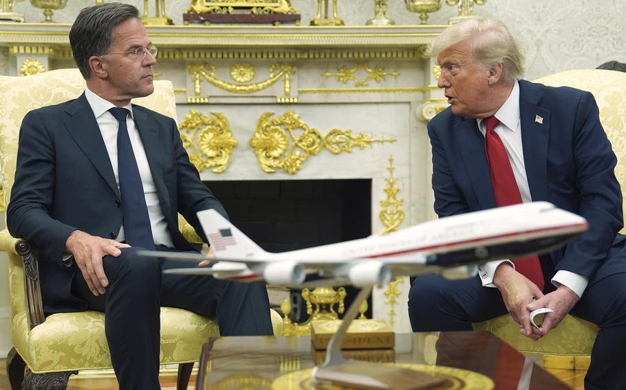President Donald Trump, right, meets with NATO Secretary General Mark Rutte