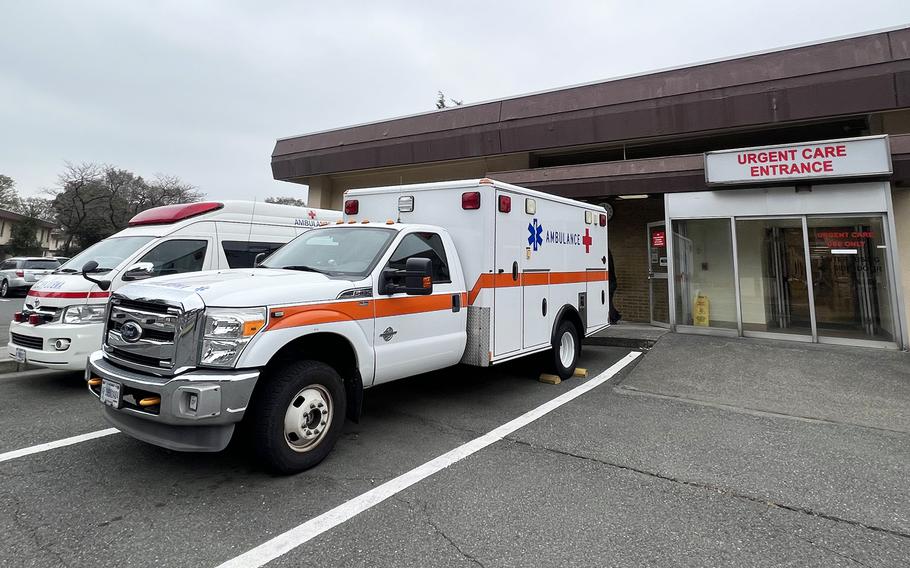Japanese and American ambulances park outside the 374th Medical Group building at Yokota Air Base, Japan, in March 2023.