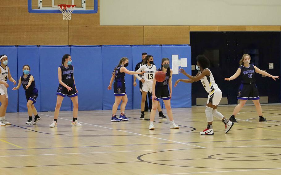 Ansbach’s Heaven Jackson passes the ball to a teammate during a game against Brussels at Ansbach, Germany, on Friday, Feb. 4, 2022.